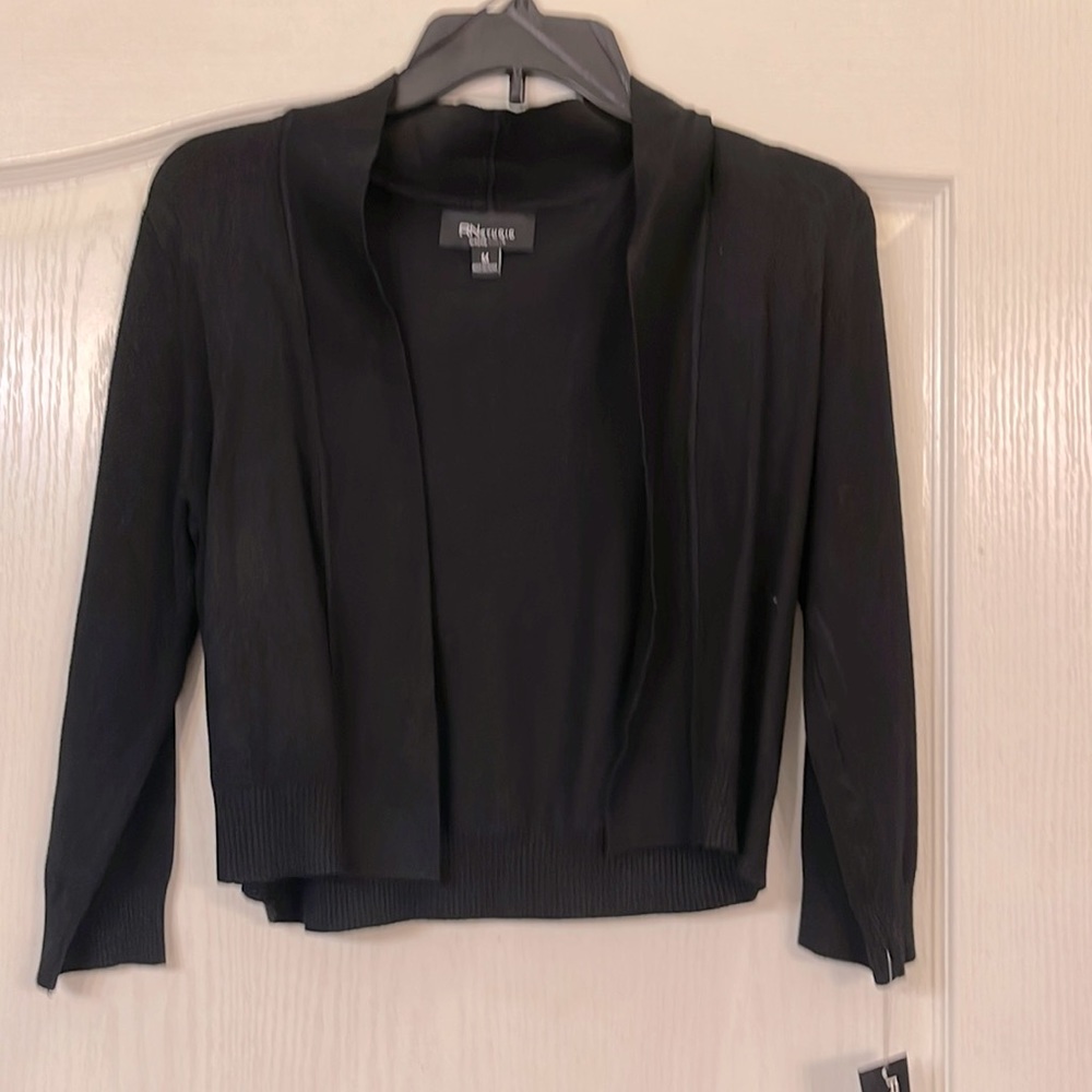 Cardigan black NWT medium 72% Rayon 28% Nylon.